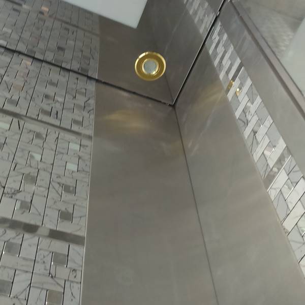 آسانسور اشراق کابین استیل طرح دار پازل